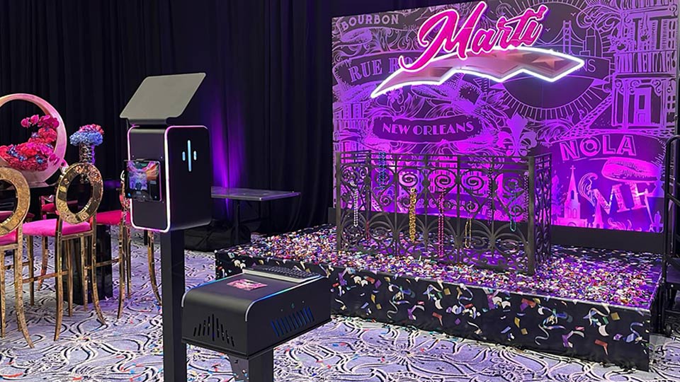 custom backdrop with our black venture photo booth in florida